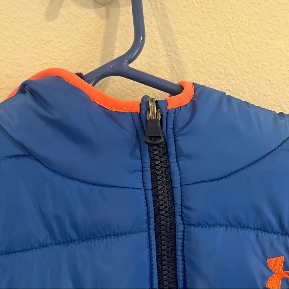 Under Armour kids size X-Large blue and orange reversible puffer jacket hooded